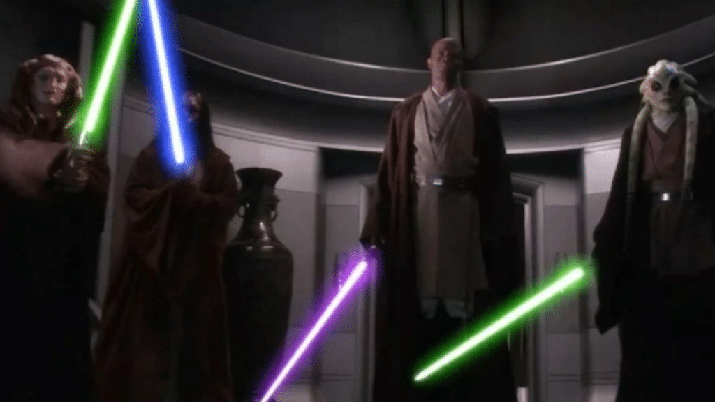 Four Jedi with lightsabers in a dim room.