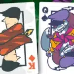 Four Balatro GodGame TTRPG face cards featuring stylized kings and queens over a purple swirling background.