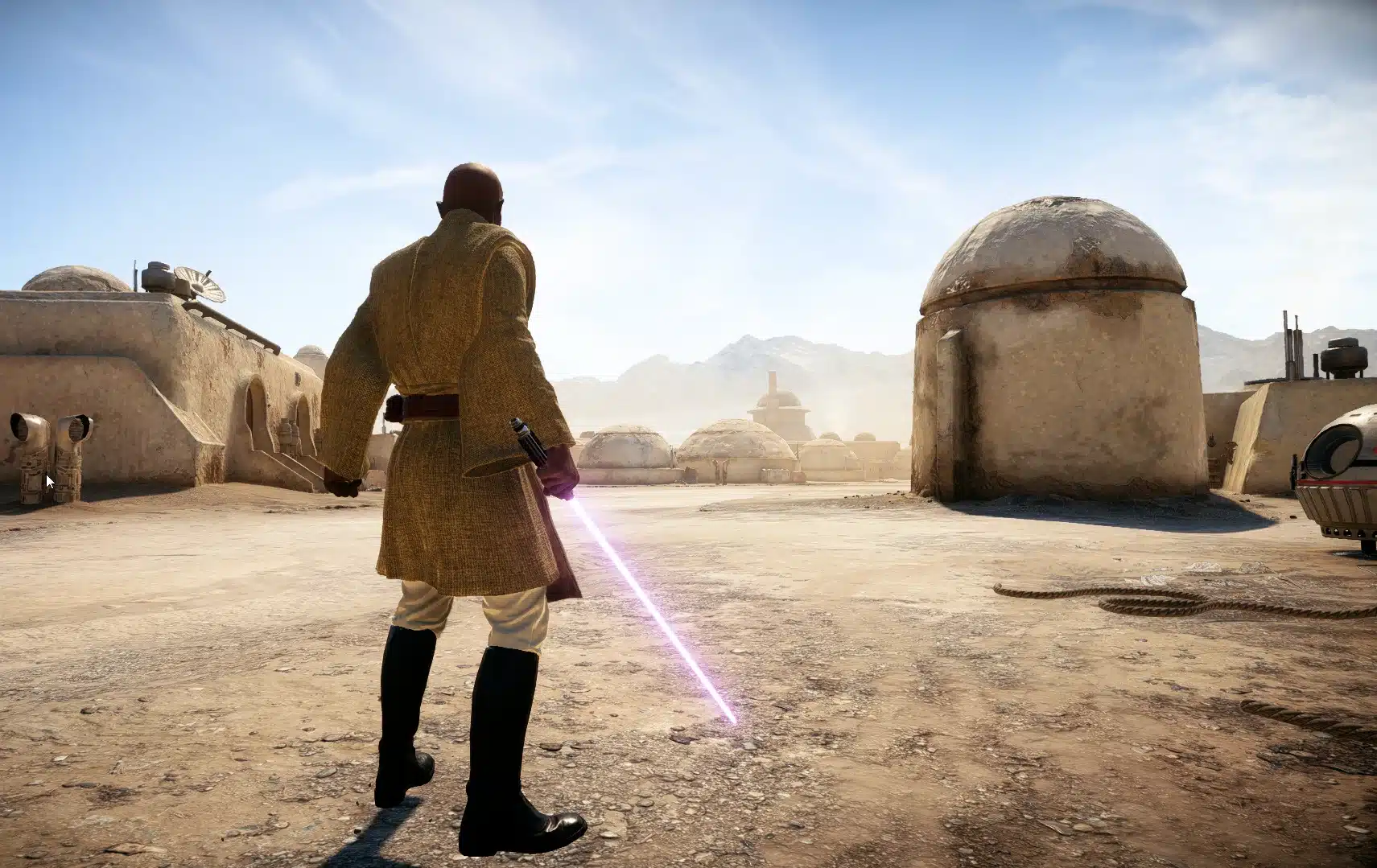 Mace Windu overlooking Tatooine with purple lightsaber in hand