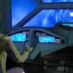 Atton Rand piloting the Ebon Hawk through hyperspace in Knights of the Old Republic II: The Sith Lords. The restored dialog mod brings back Atton's conversation about the astronavigation system, adding depth to this iconic scene.