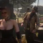 Sadie Adler in a sexy corset outfit standing at the Van der Linde gang’s camp in Red Dead Redemption 2