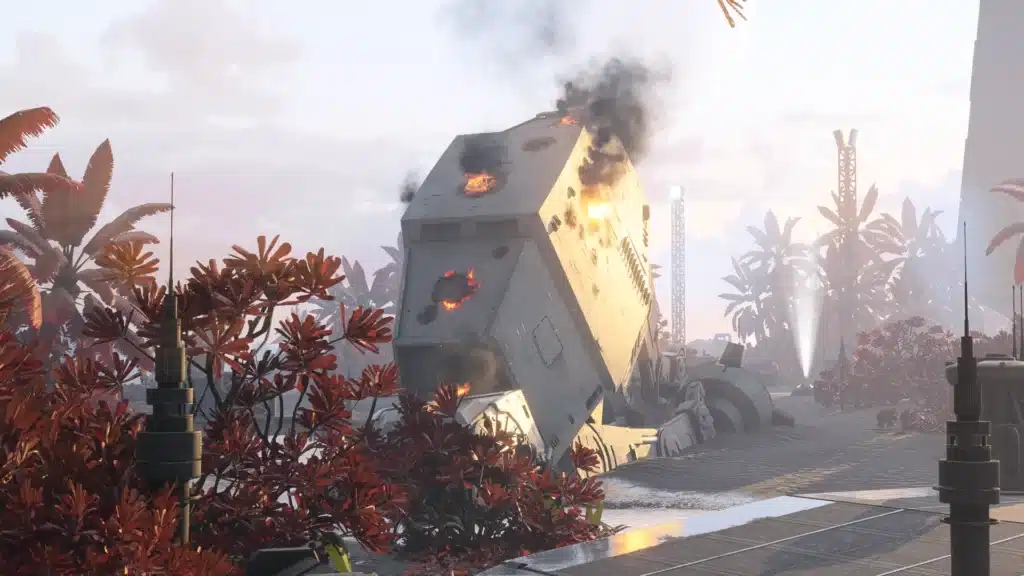 Destroyed AT-AT walker burning in red-tinted Scarif jungle