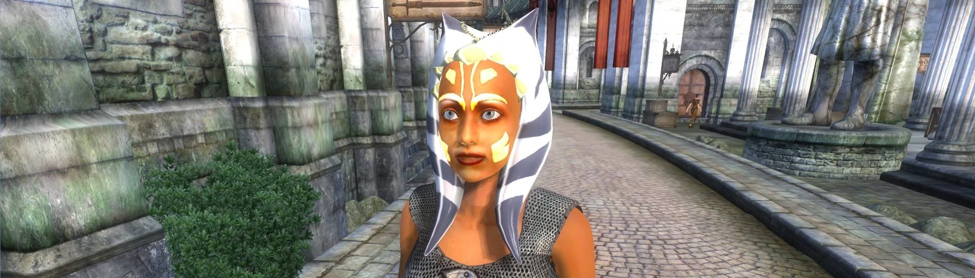 Close-up of Ahsoka Tano's face in Oblivion Remastered, highlighting the vibrant tattoos and unique Togruta headpiece. This image captures the essence of her character from Star Wars: The Clone Wars, now playable in Tamriel.