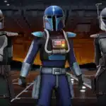 Three Mandalorians in custom armor standing in a hangar