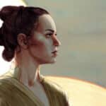 Rey holding a yellow lightsaber with twin suns in the background on variant comic cover