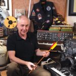 Ben Burtt in his sound design studio surrounded by vintage equipment and Star Wars props
