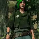 Kay Vess wearing the Forest Commando DLC outfit in a jungle environment in Star Wars Outlaws