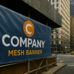 Large mesh banner on scaffolding in New York City street promoting a company