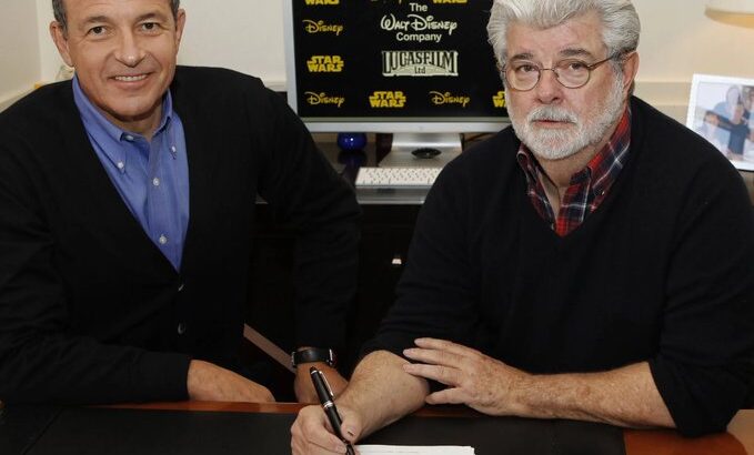 Disney CEO and filmmaker signing the Lucasfilm acquisition deal in 2012