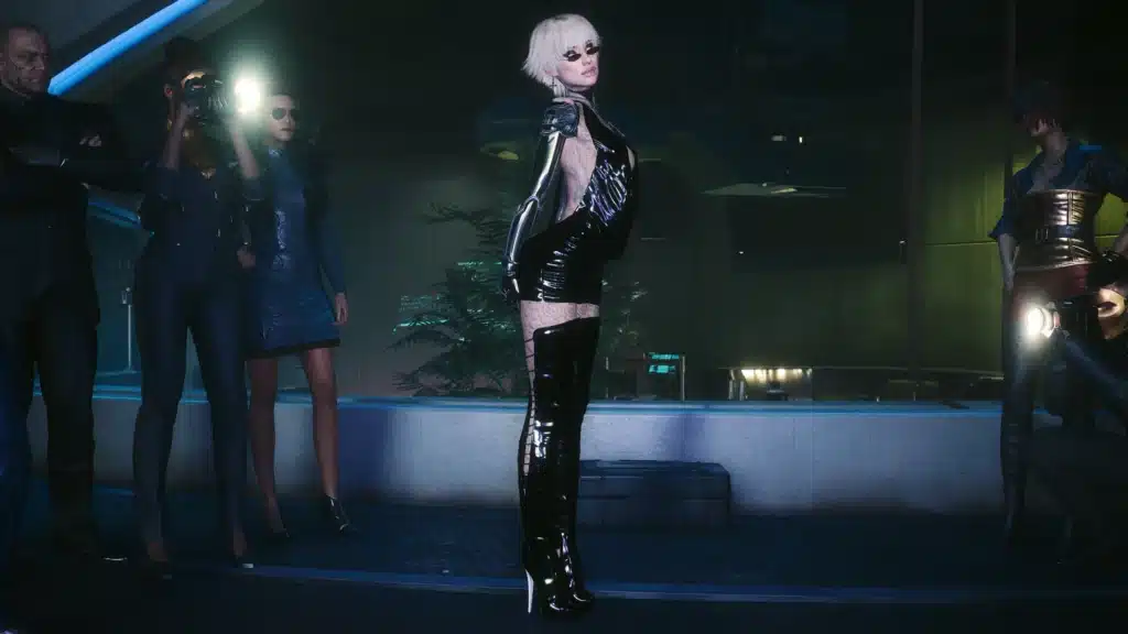 Cyberpunk 2077 character posing on a red-carpet-style scene wearing glossy black Chxin Thigh High Boots.