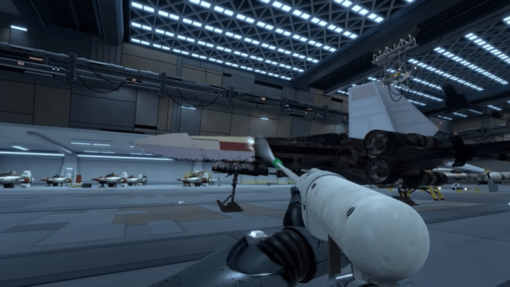 Technician repairing fighter jet inside modern hangar