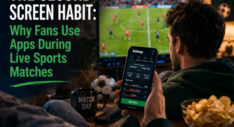 Fan watching a live football match on TV while using a sports app on a smartphone at home