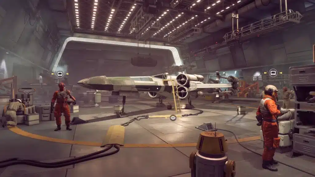 Star Wars X-Wing Alliance 1999 hangar screenshot showing an X-wing under maintenance with Rebel pilots and crew
