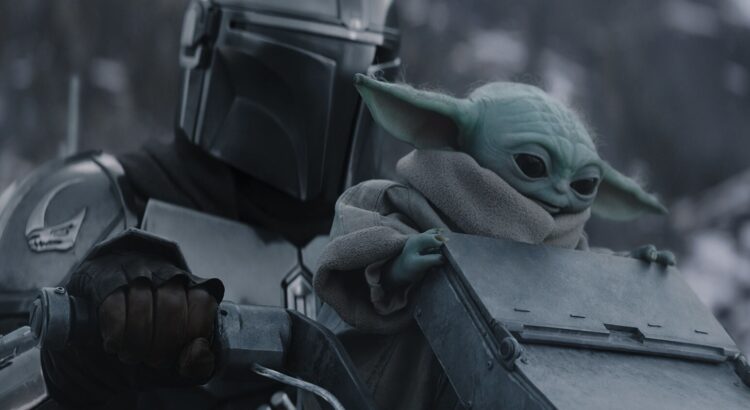 Mandalorian and Grogu riding through snowy forest