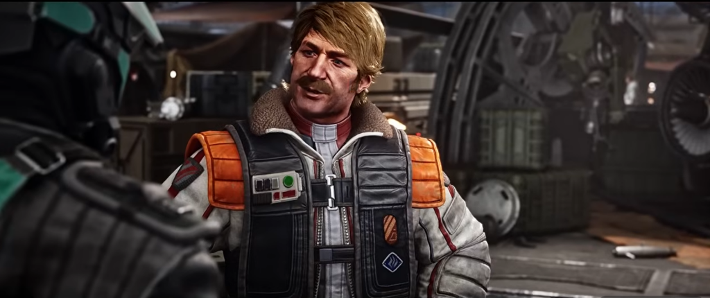 Mustached pilot in orange flight suit in hangar