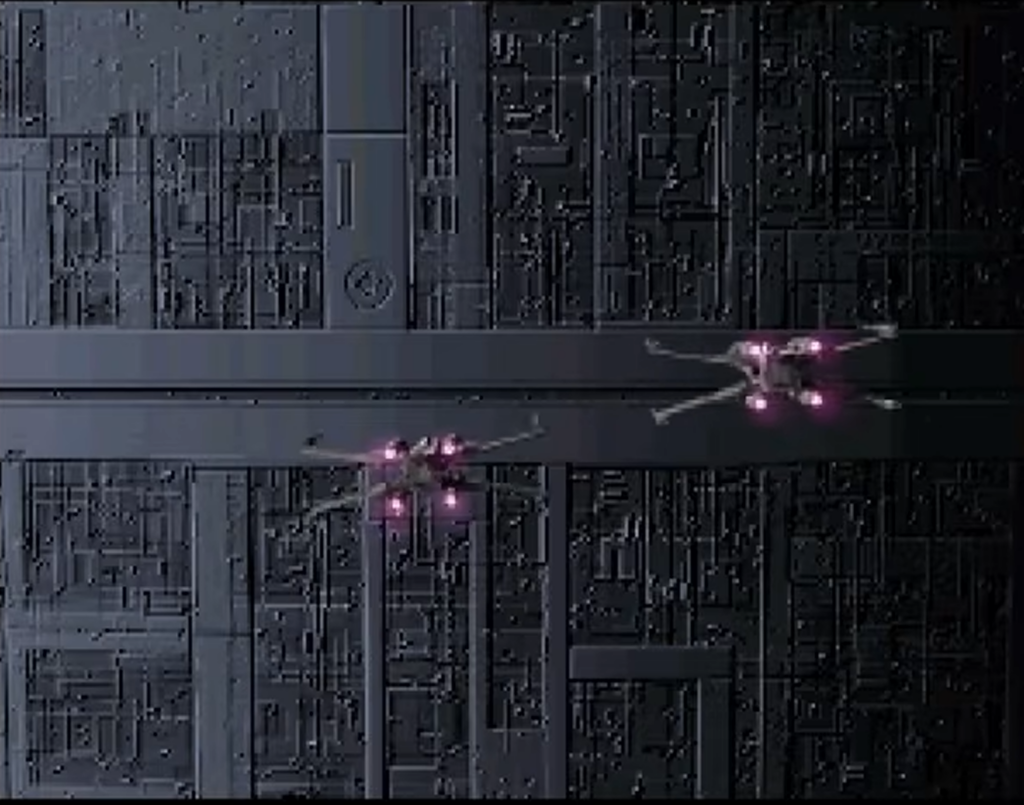 Two futuristic drones flying through industrial corridor