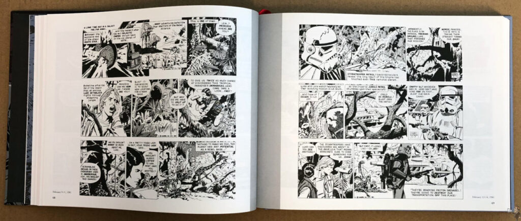 Open book showing black-and-white Star Wars comic